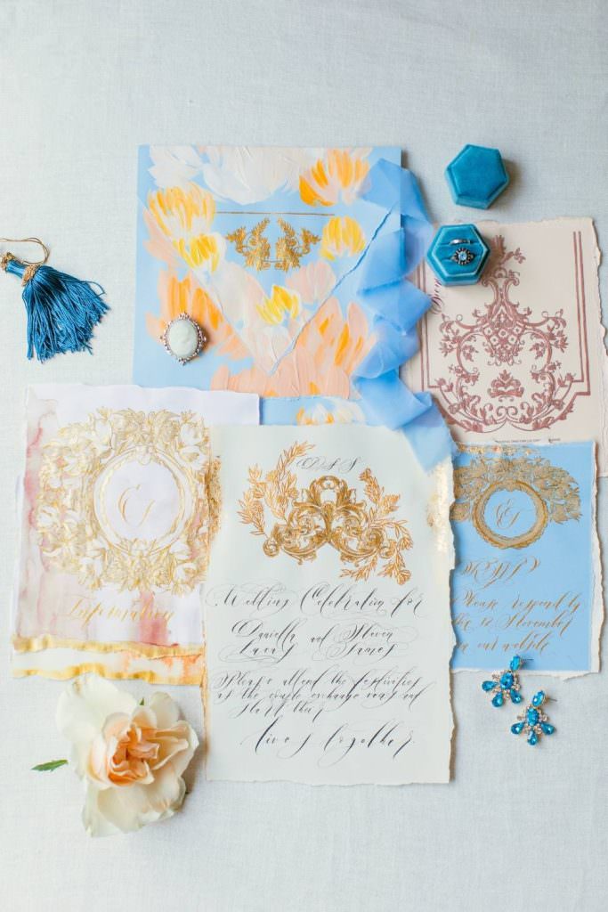 Couture wedding invitations custom designed with rich cobalt blue, yellows and blush with gold accents