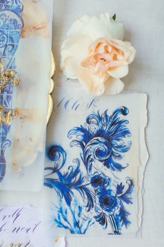 Destination wedding invitations with blue Azulejos inspired vow book