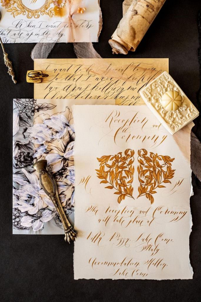 High- end wedding invitations for a luxury wedding in Venice with creme, pale pink and rich black and gold accents.