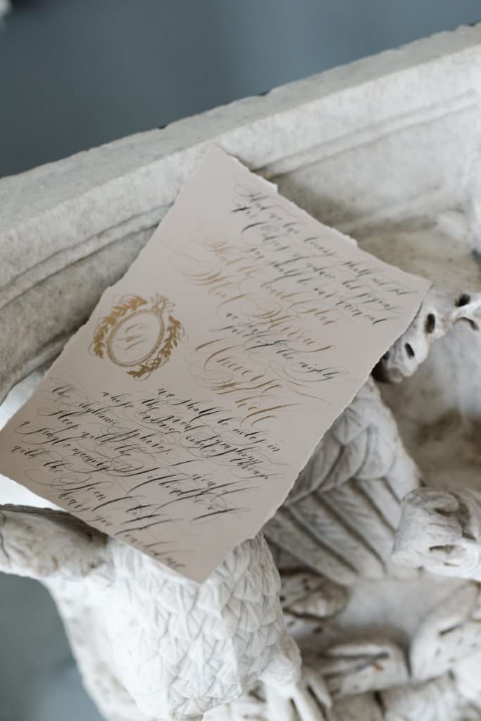 Villa Astor fine art wedding stationery with pale metallic beige and rich gold and black calligraphy