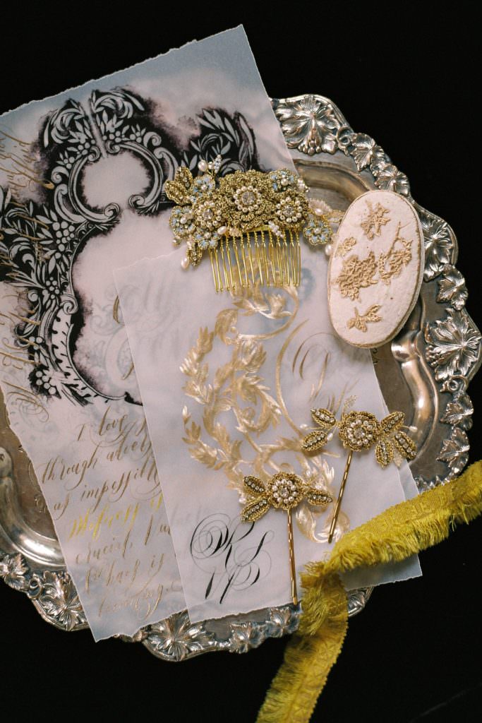 Moody black and gold classical wedding stationery inspired by renaissance and old world ornate style