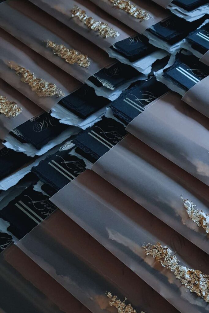 Black tie anniversary invitations with calligraphy wraps