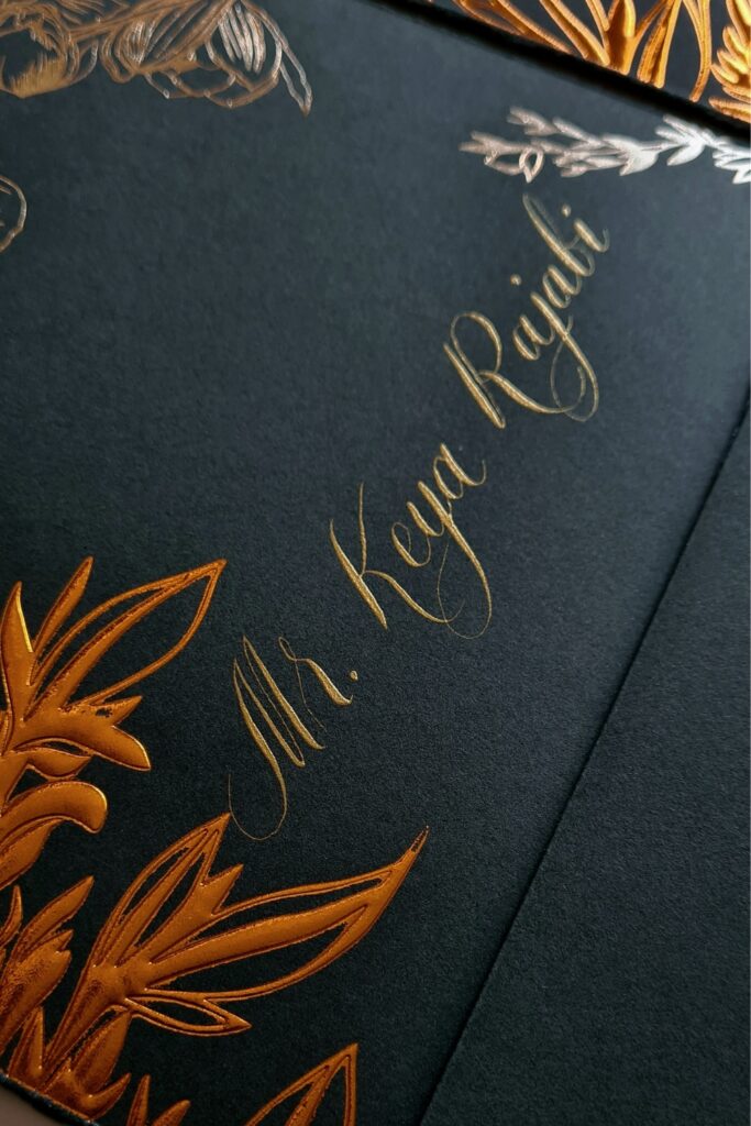 Luxury Dark green and gold custom envelope design with handwritten calligraphy