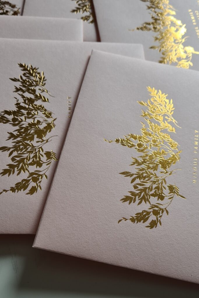 Luxury blush and gold foil leaves rsvp envelope for a high end wedding in New York