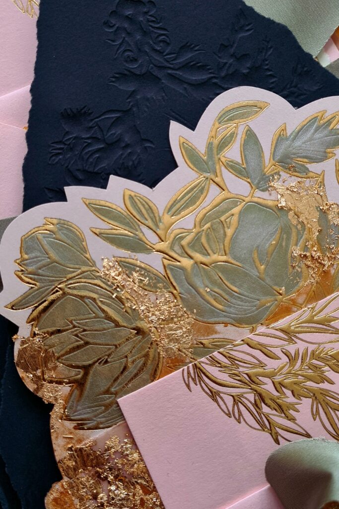 Luxury hand painted gold embossing wedding invitation design with floral design with a die cut edge for a black tie blush New York wedding
