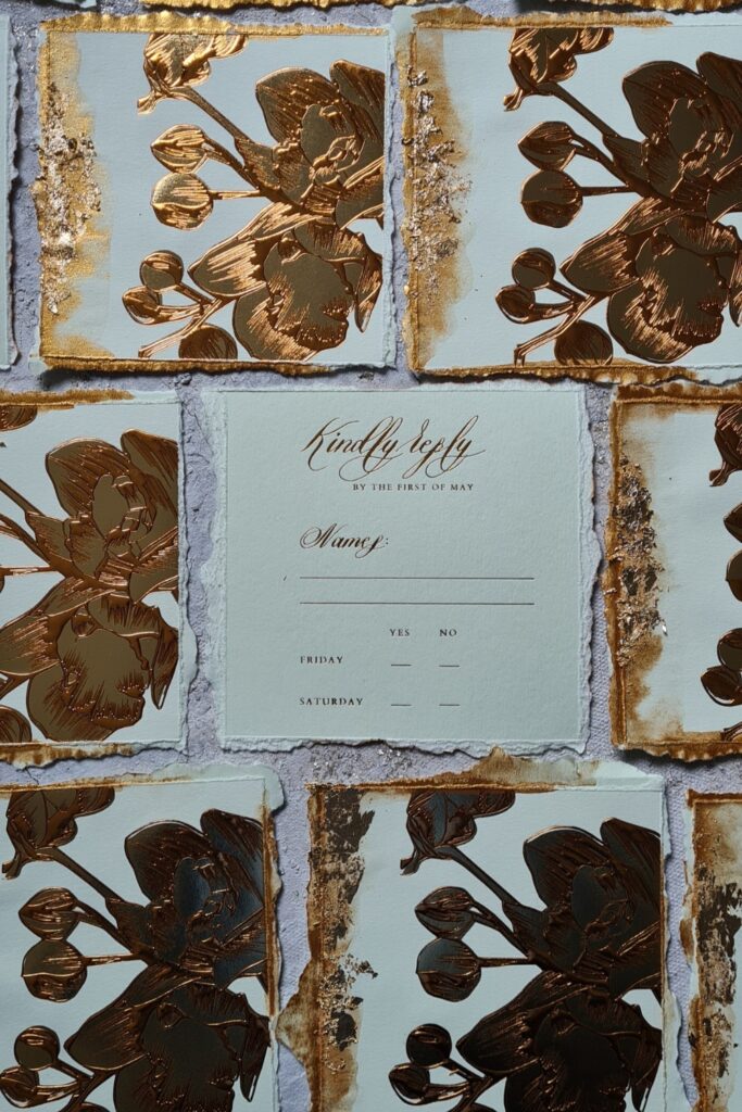 Pale green and gold luxury embossed orchid rsvp card design for a New York wedding