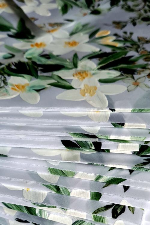 Romantic and chic, light and ethereal white vellum envelopes with hand painted floral design